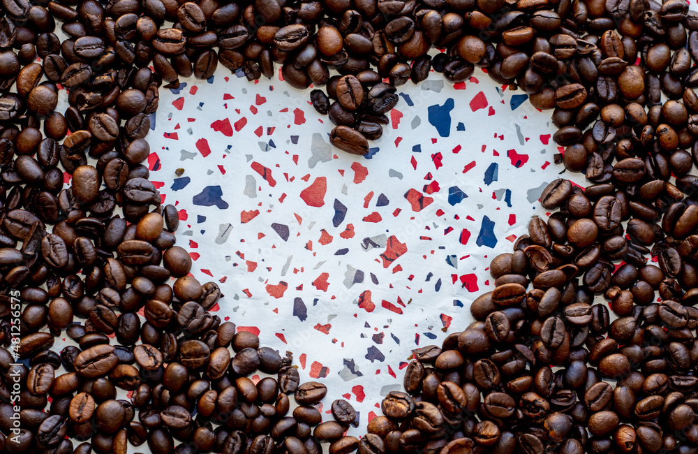 heart shape from coffee beans. beautiful high quality wallpaper for valentine's day. celebrating love. little colorful particles on paper. ready for greeting. free space for text. heart shape from coffee beans. beautiful high quality wallpaper for valentine's day. celebrating love. little colorful particles on paper. ready for greeting. free space for text.