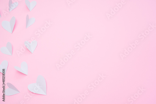 White paper hearts on pink background for Happy Valentine's Day. Happy mother's day © Ekaterina