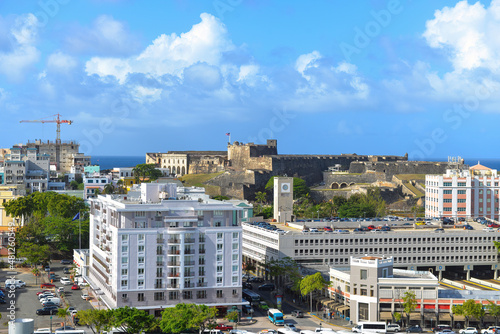 Buildings in old San Juan, Puerto Rico with Castillo San Cristóbal, the largest fortification built by the Spanish in the New World, on the hill in the background 