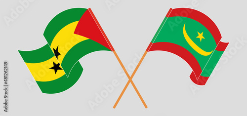 Crossed and waving flags of Sao Tome and Principe and Mauritania