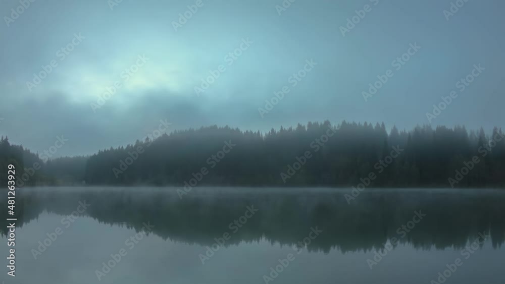 Time lapse video of Savsat Karagol Black lake in Eastern Black Sea region during morning evaporation. Savsat Karagol lake is a large trout lake in the forest in Artvin, Turkey Time lapse video of Savsat Karagol Black lake in Eastern Black Sea region during morning evaporation. Savsat Karagol lake is a large trout lake in the forest in Artvin, Turkey