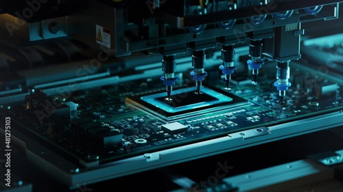 Automatic Pick and Place machine quickly installs Components on Circuit Board. Electronics and Circuit board Manufacturing Factory. Loopable.