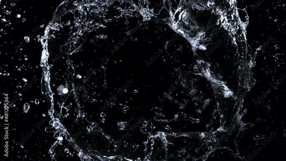 Super Slow Motion Shot of Rotating Water Ring Moving Towards Camera at 1000fps.