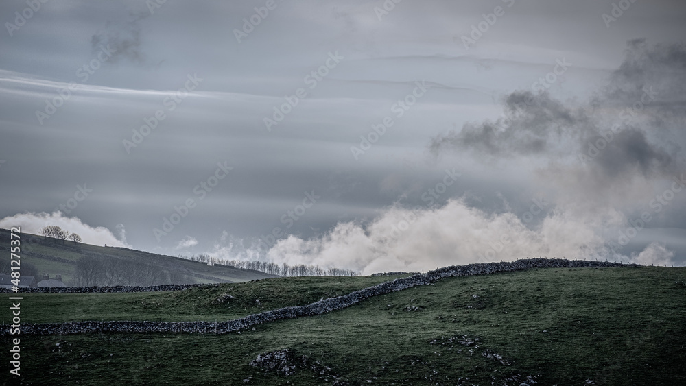 Strom brewing over a bleak Peak District Landscape