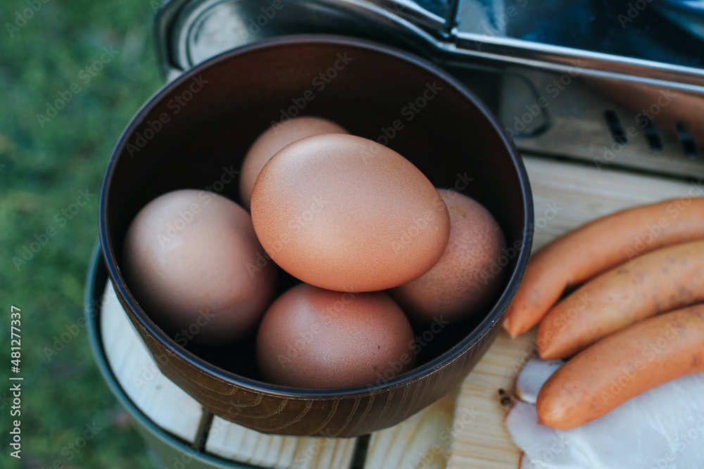 Organic Chicken eggs with sausage and ham for healthy breakfast on holiday. Organic Chicken eggs with sausage and ham for healthy breakfast on holiday.