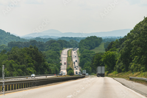 Virginia interstate highway i81 81 steep road with traffic cars trucks in summer and scenic trip open view of blue ridge mountains