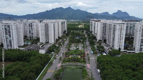 Aerial view of Cidade Jardim, in Jacarépagua, Rio de Janeiro, Brazil. Residential buildings and mountains in the background. Cloudy day. Drone take. photo
