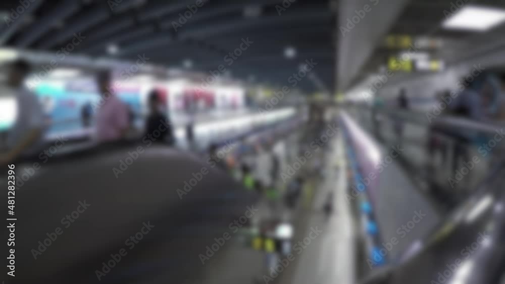 Blurred defocused timelaps of asian people travel at rush hour Subway. Timelapsed crowd of people inside the train station in Taipei, travelers take the metro for trip Blurred defocused timelaps of asian people travel at rush hour Subway. Timelapsed crowd of people inside the train station in Taipei, travelers take the metro for trip