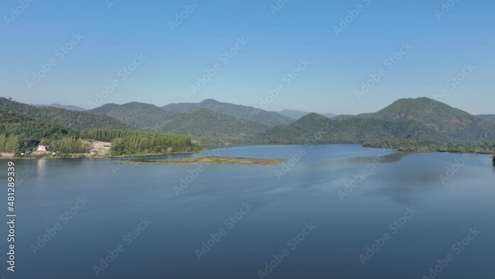 flying over green forest mountain hill lake with day mist weather feel fresh and energy 4k stock footage flying over green forest mountain hill lake with day mist weather feel fresh and energy 4k stock footage