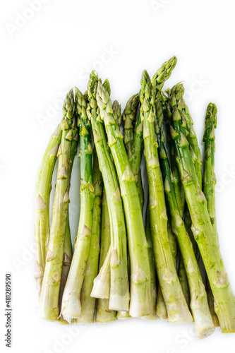 Group of raw green asparagus isolated on white background.