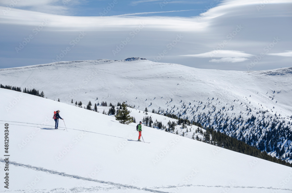 skiing across the backcountry of colorado