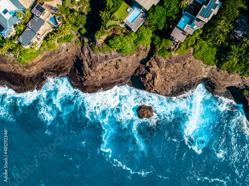 Hawaii Aerial View of Light Blue Water and Cliffs