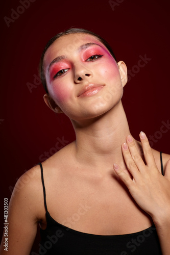 Young beautiful woman smile makeup attractive look pink background unaltered