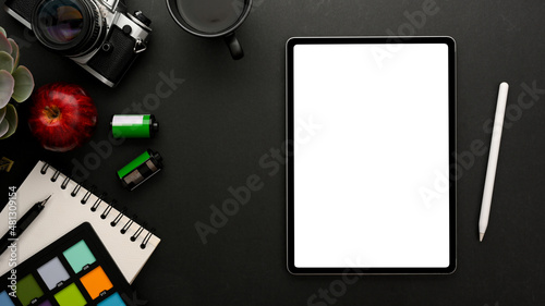 Photographer or designer studio workspace with digital tablet mockup.