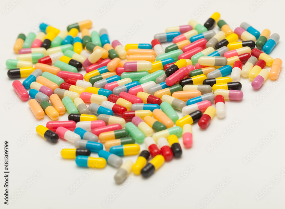 colorful pills on white background colorful pills on white background