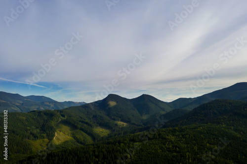 Picturesque view of mountain landscape with forest in morning. Drone photography