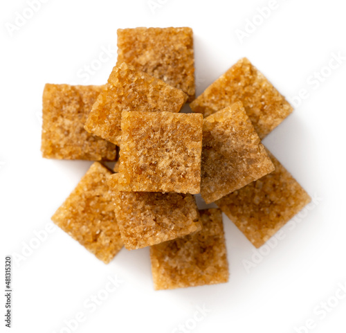 Brown sugar cubes isolated on white background, top view