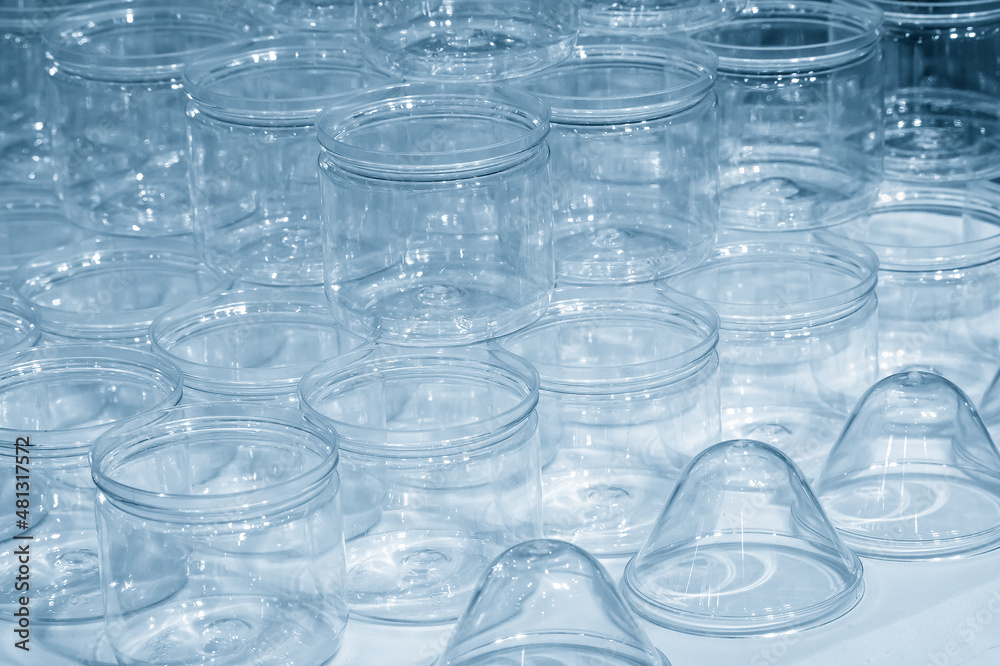 The group of transparent plastic container in the light blue scene. The group of transparent plastic container in the light blue scene.