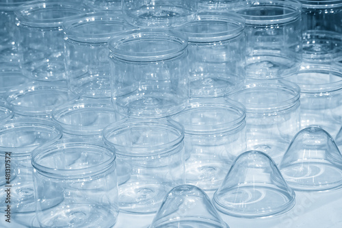 The group of transparent plastic container in the light blue scene.