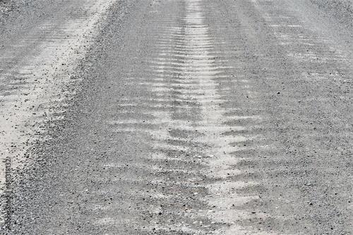 Washboard pattern on a gravel road.