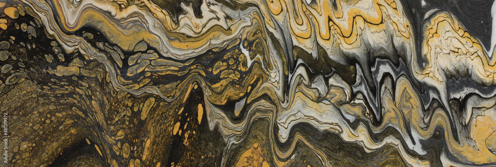 art photography of abstract marbleized effect background with gold, black and white creative colors. Beautiful paint.