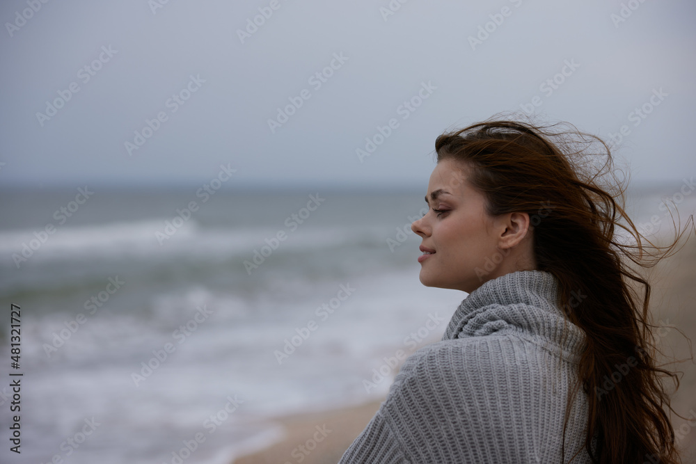 pretty woman cloudy weather by the sea travel fresh air Lifestyle pretty woman cloudy weather by the sea travel fresh air Lifestyle