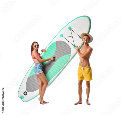 Young couple with board for...