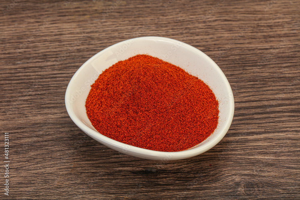 Dry paprika powder in the bowl