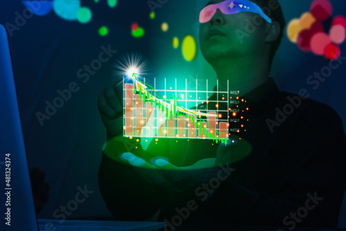 stock investor hold tablet show graph of stock market in hologram via metaverse