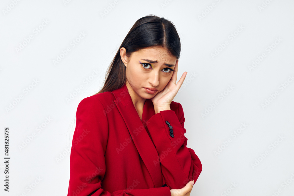 attractive girl in a red jacket cosmetics smile isolated background unaltered attractive girl in a red jacket cosmetics smile isolated background unaltered