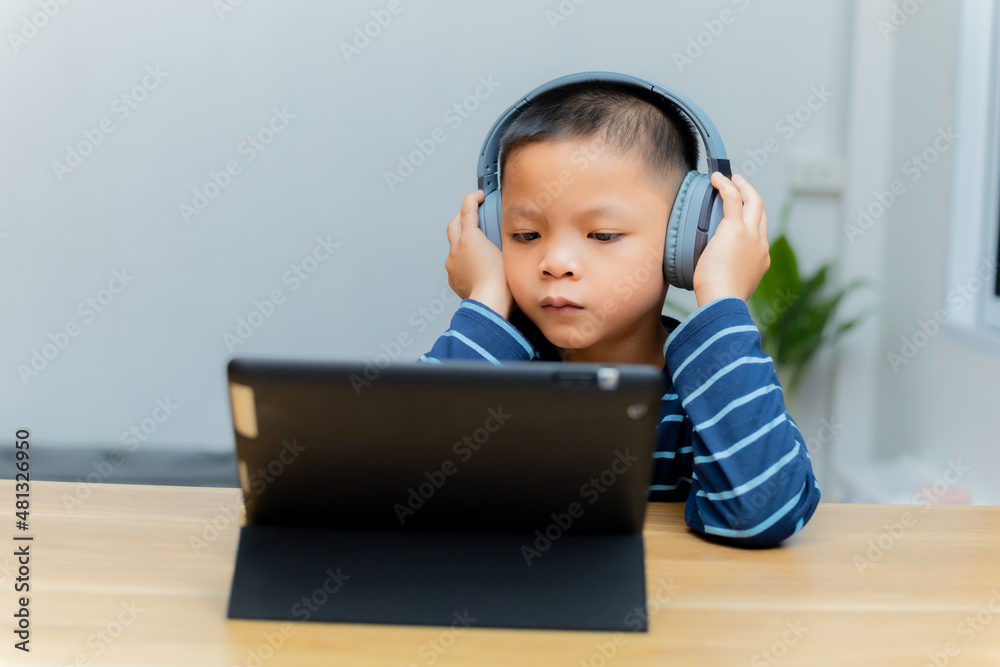 Children study online through tablets at home. Children study online through tablets at home.