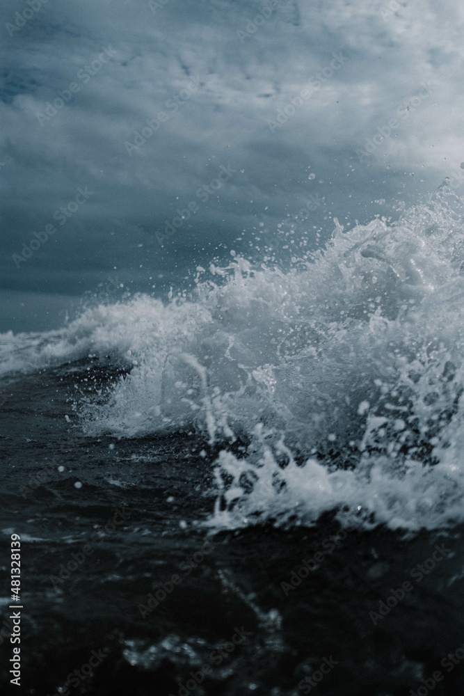 Fototapeta premium waves crashing on beach, dark, winter waves 