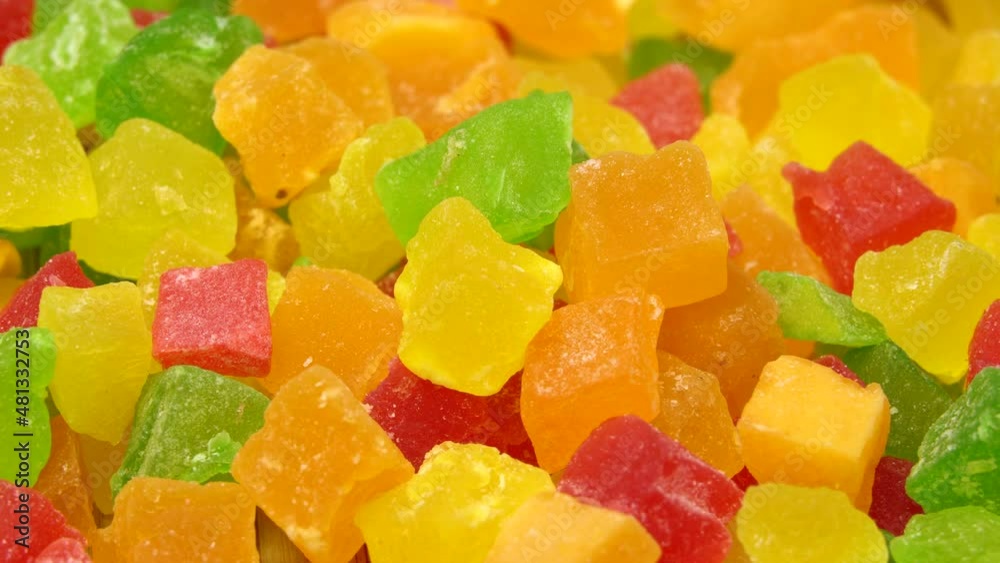 Colorful candied fruits, rotation background. Close up. Loop motion Colorful candied fruits, rotation background. Close up. Loop motion