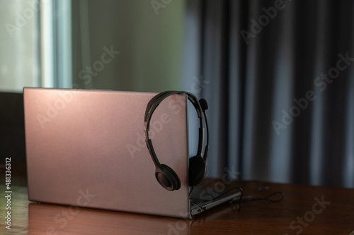 Headphone and laptop computer. Work from home and studying online concept.