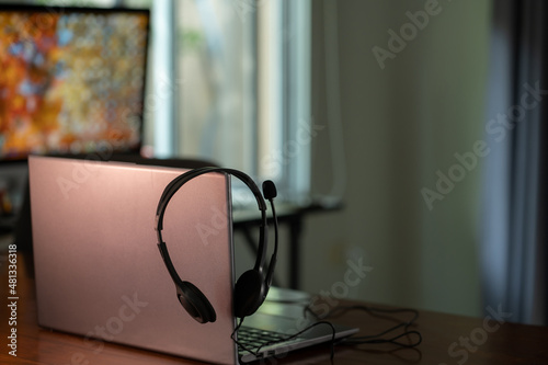 Headphone and laptop computer. Work from home and studying online concept.