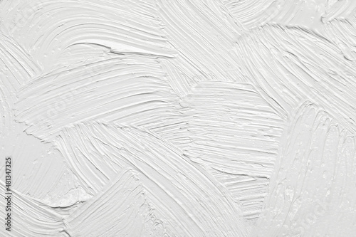 Strokes of white oil paint as background, closeup