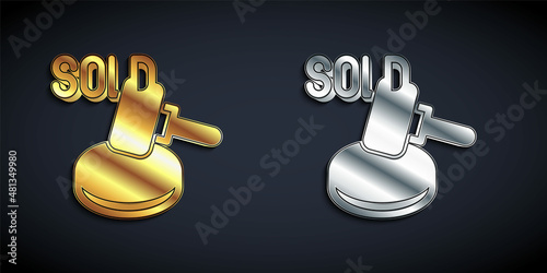 Gold and silver Auction hammer icon isolated on black background. Gavel - hammer of judge or auctioneer. Bidding process, deal done. Auction bidding. Long shadow style. Vector