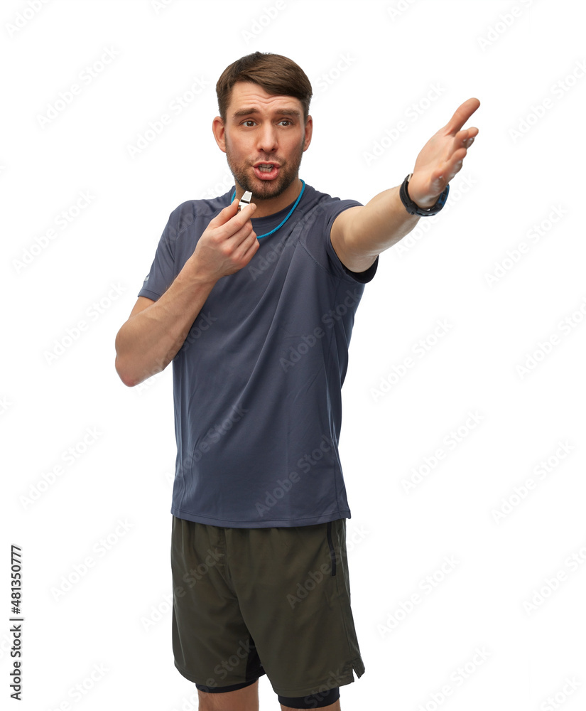 Fototapeta premium fitness, sport and healthy lifestyle concept - displeased male trainer or referee with whistle over white background