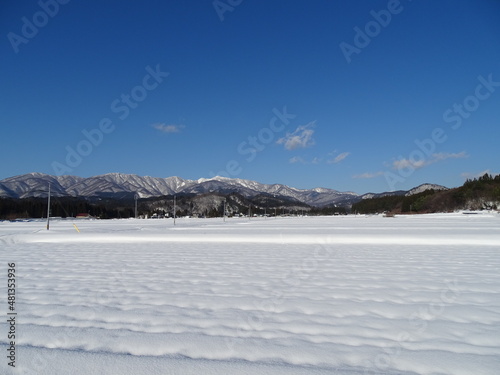 Fototapeta Naklejka Na Ścianę i Meble -  雪の農村風景
