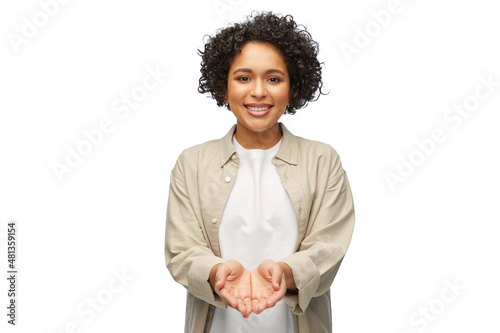 Quadro su tela people, ethnicity and portrait concept - happy smiling woman in shirt holding so