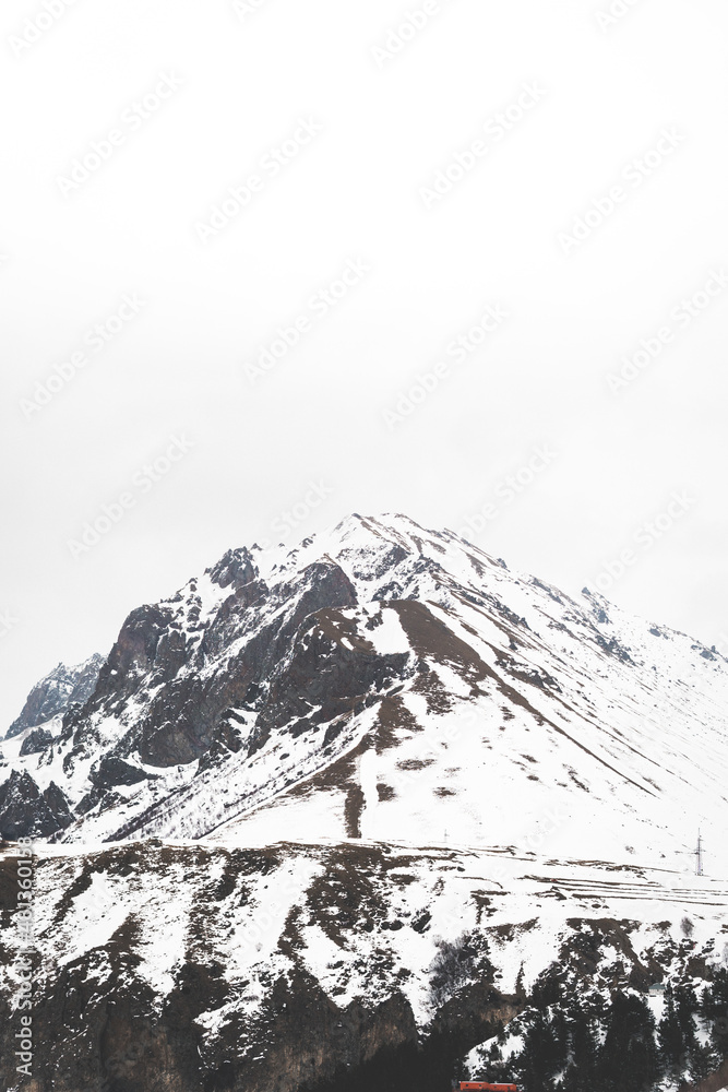 Winter mountains panorama with ski slopes. Caucasus