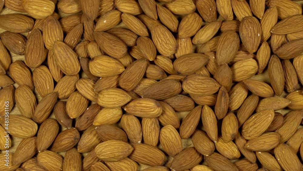 Almond nuts rotation background. Close up Almond nuts rotation background. Close up