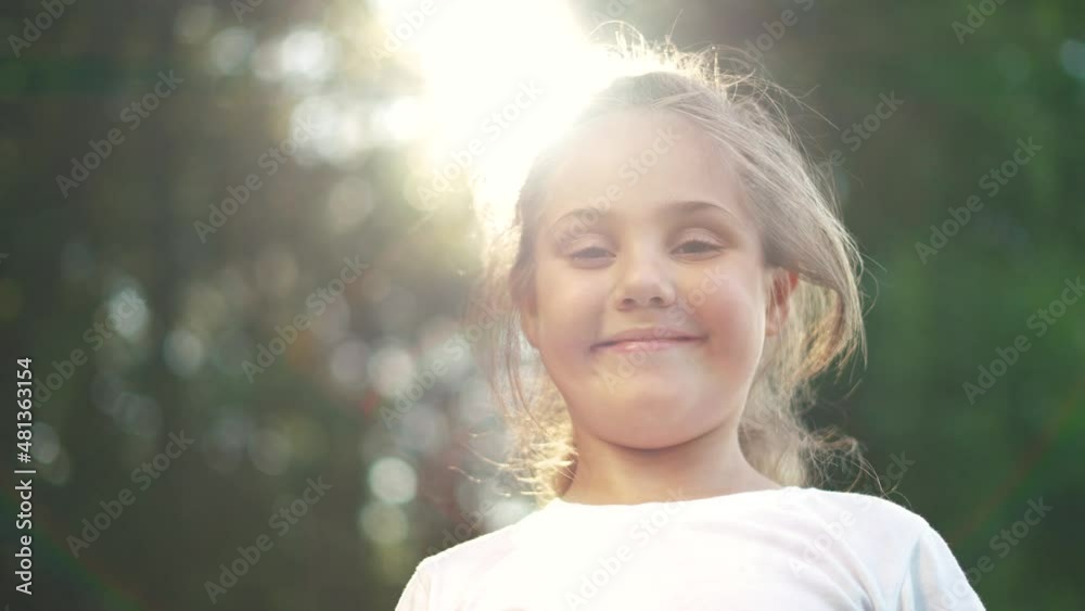 little girl smiling in the park. free happy girl child portrait outdoors in park cute smiling at camera. happy family kid dream concept. childhood family fun summer. child smiling portrait lifestyle little girl smiling in the park. free happy girl child portrait outdoors in park cute smiling at camera. happy family kid dream concept. childhood family fun summer. child smiling portrait lifestyle