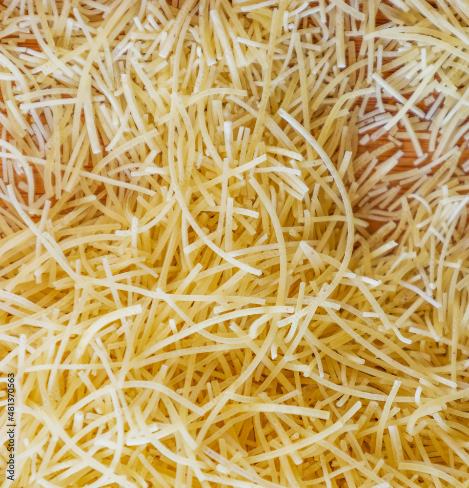 Classical dry italian pasta noodles close up Classical dry italian pasta noodles close up