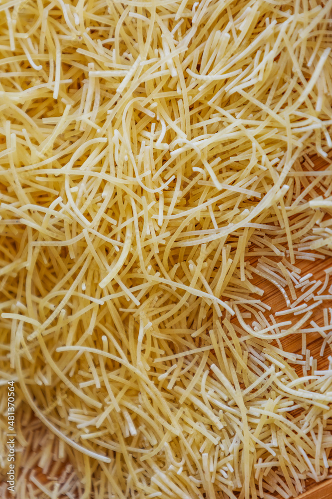 Classical dry italian pasta noodles close up