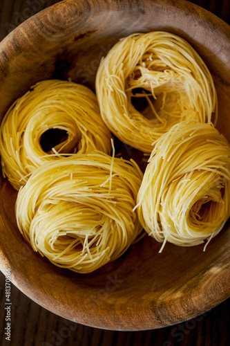 Classical dry italian pasta noodles close up photo