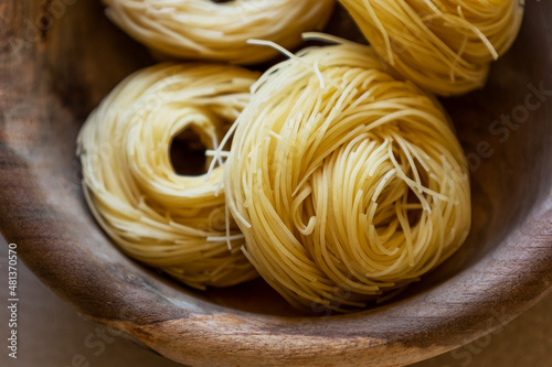 Classical dry italian pasta noodles close up