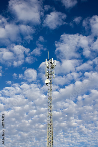 upward of Communication Radio antenna Tower, microwave antenna tower on blue sky background