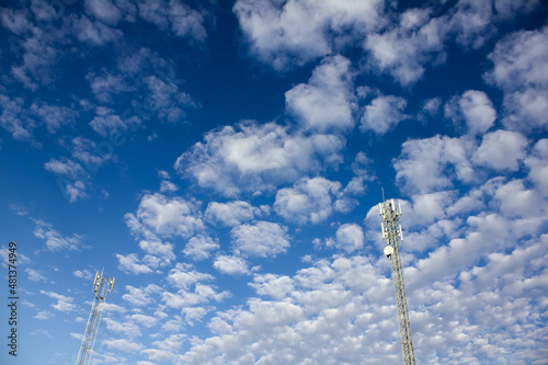 upward of Communication Radio antenna Tower, microwave antenna tower on blue sky background