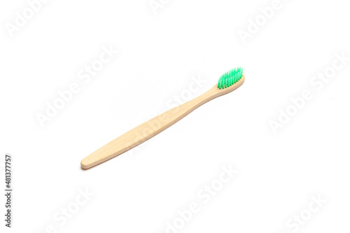 Toothbrush made of bamboo isolated on white background. Plastic free.